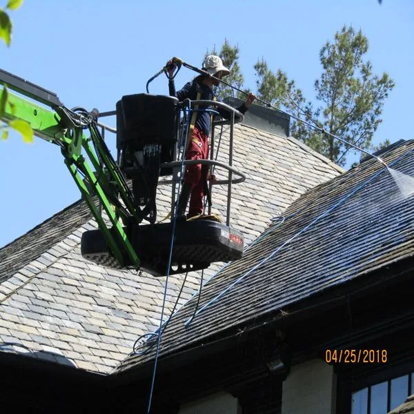 Lift roof cleaning service in progress